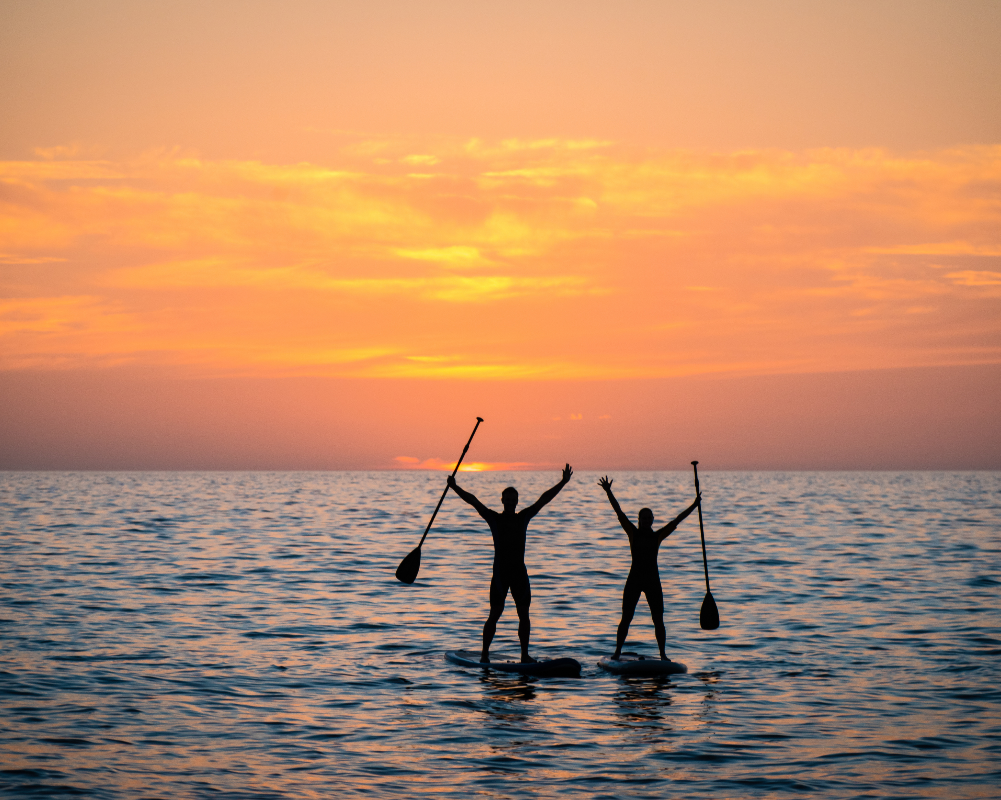 paddleboarding sunset tour